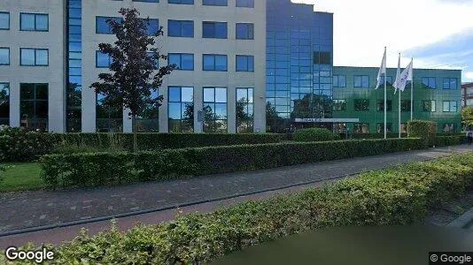 Bedrijfsruimtes for rent i Huizen - Foto uit Google Street View